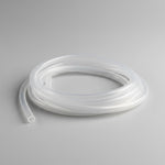 Clear silicone hose on a gray background