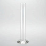 Clear cylindrical vase on a white background