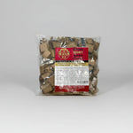 Packaged wood chunks for smoking with a visible label on a white background