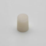 Beige cylindrical object on a white background