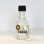 Bottle of Russian Vodka with a black cap on a white background