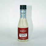 Bottle of Bombay Special Aromatic Gin concentrate with a red label on a white background