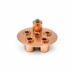 Copper metal bubble plate with multiple holes on a white background