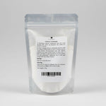 Clear packaging of calcium carbonate with a label on a white background