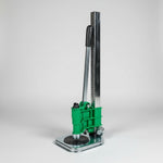 Green and silver tool on a white background